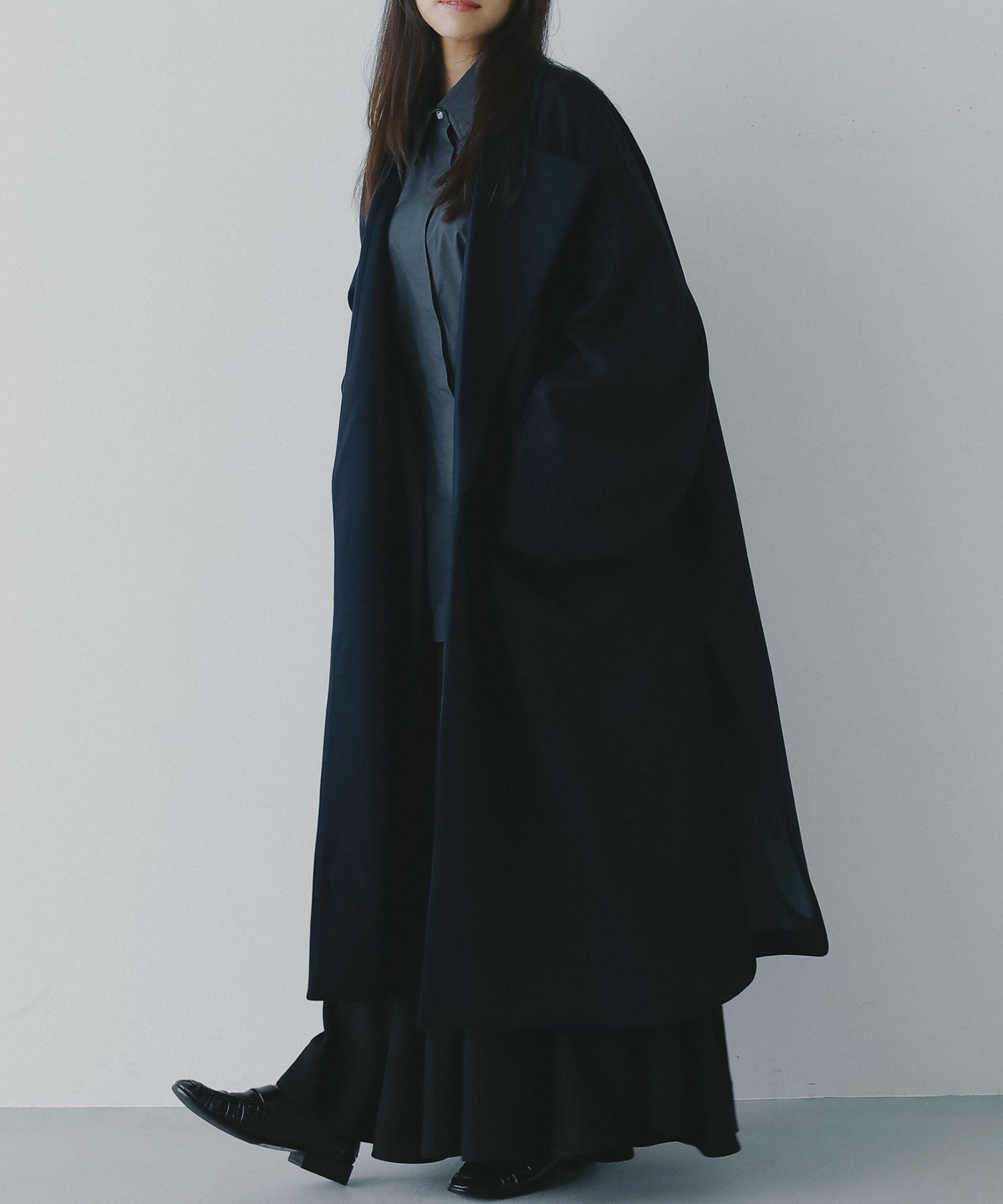 スムースポンチロングコート