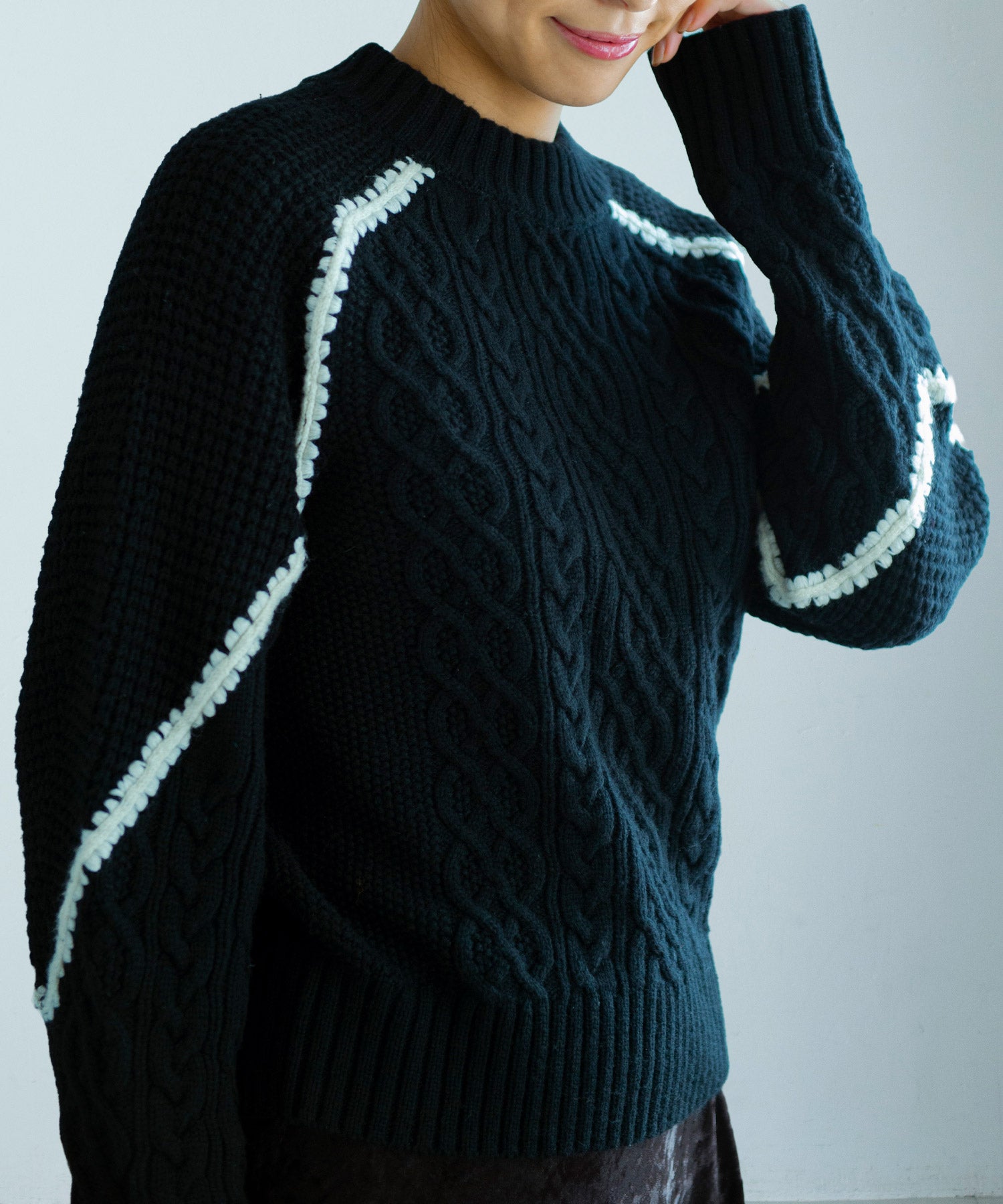 ウォッシャブルケーブルニット